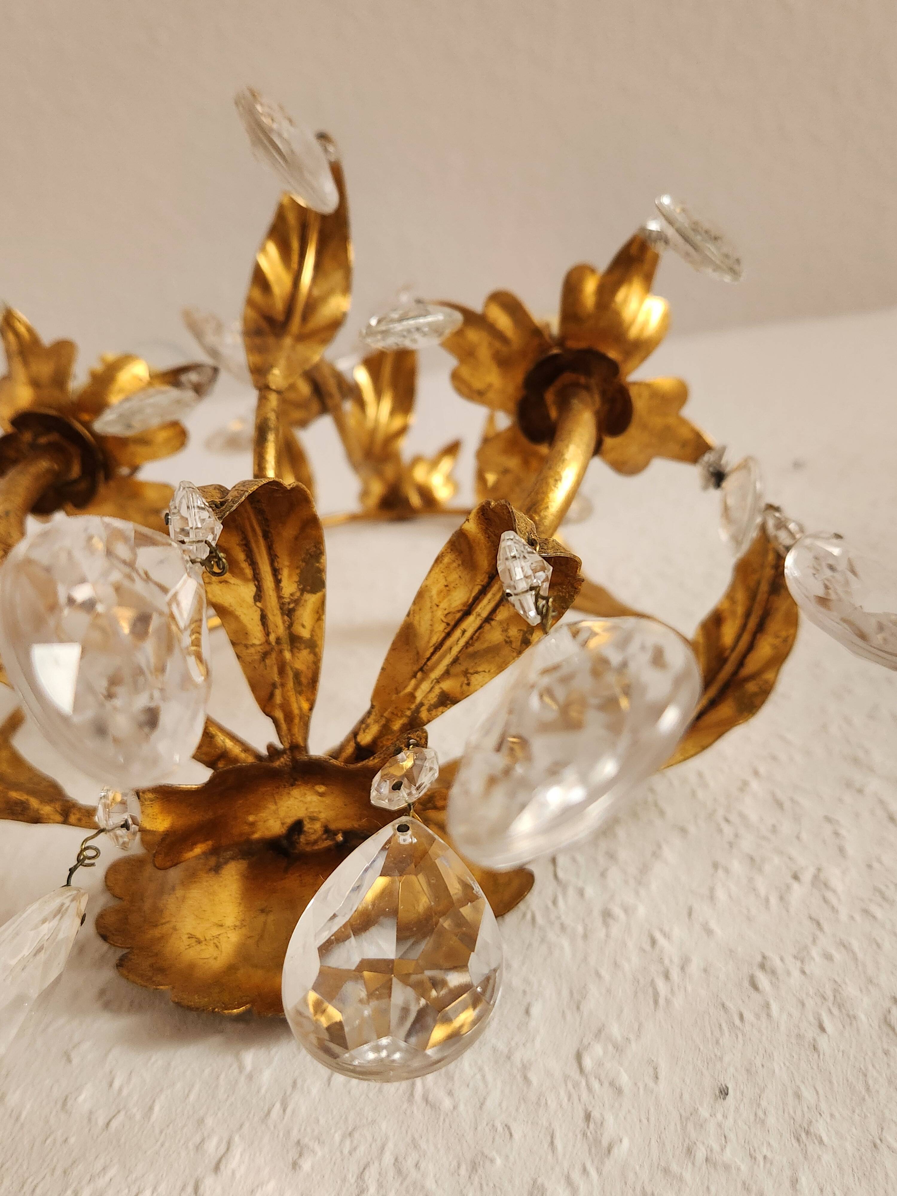 Hand-forged wall lamp gilded with gold leaf and crystals, Italy