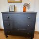 Commode anglaise en bois patiné noir