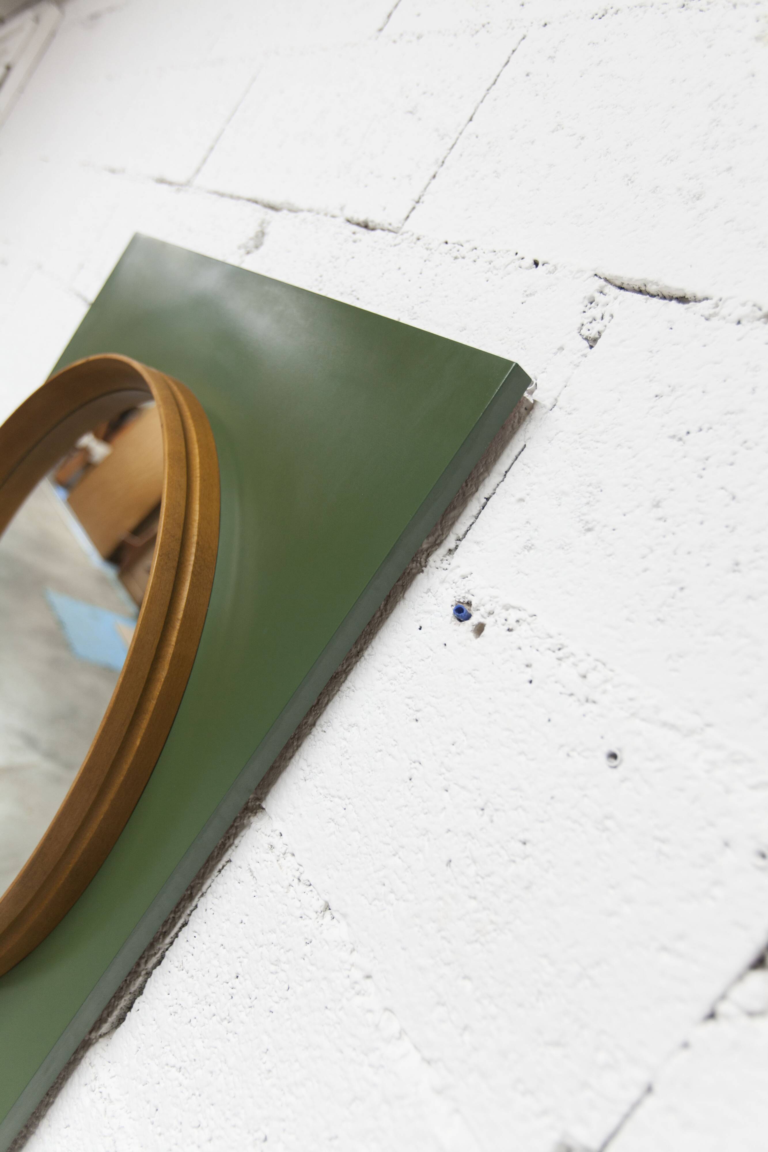 Unusual round wall mirror 60 cm teak edge on green rectangular board 1960.