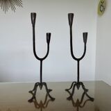 Pair of antique wrought iron candlesticks