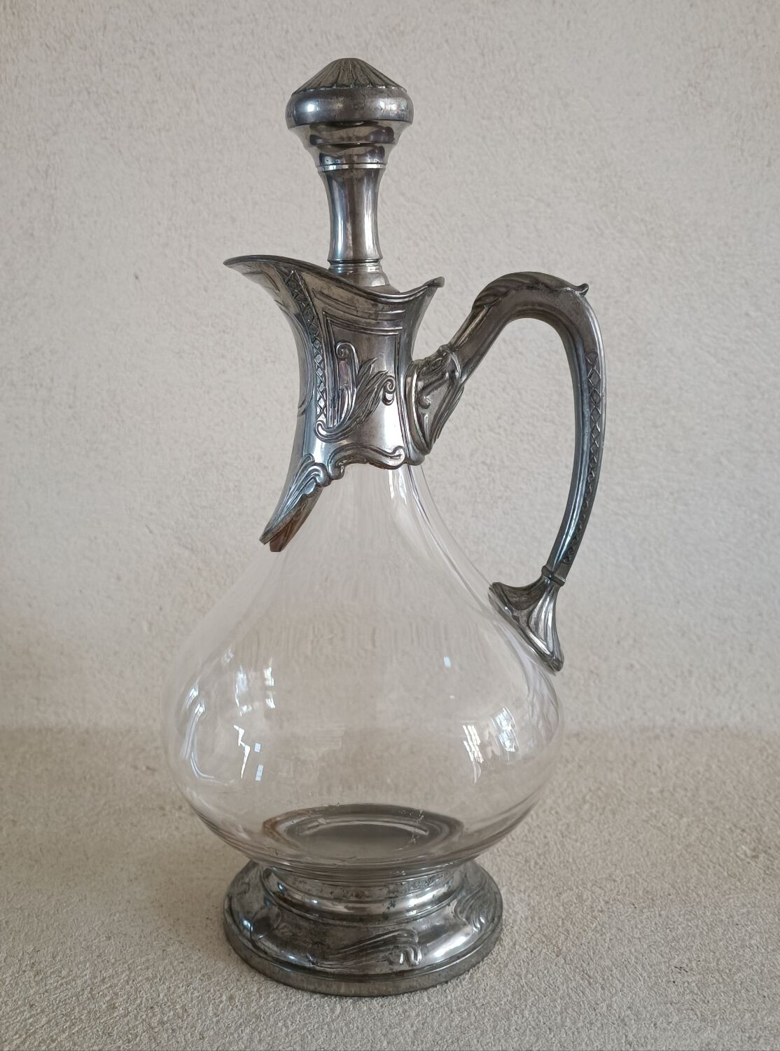 Ewer decanter with tin mount