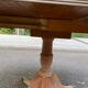 Round extendable dining table Regency central leg stripped mahogany 1960