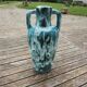 Antique turquoise terracotta amphora vase
