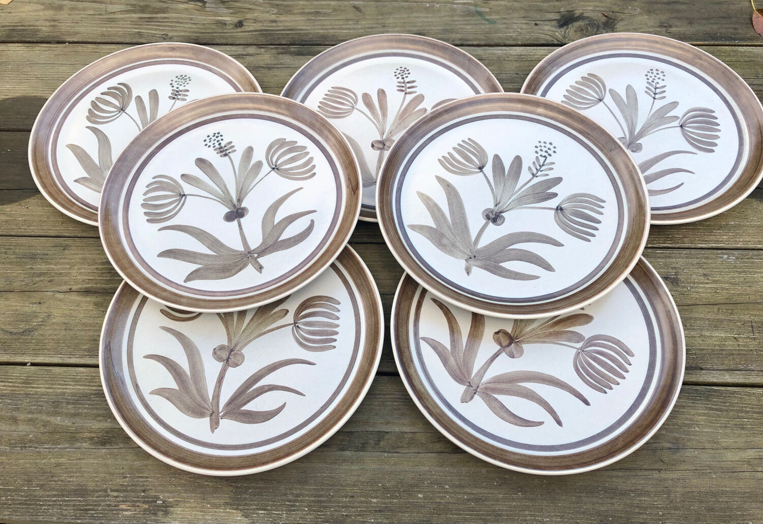 7 Longchamp stoneware plates