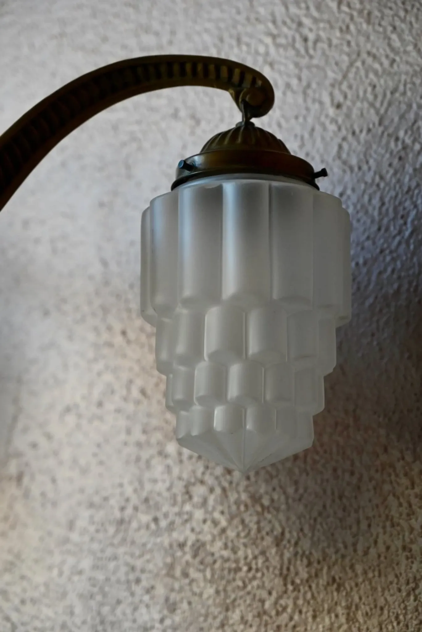 Art Deco lustre in brass and frosted pressed glass from the 1930s.