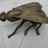 Old brass ashtray in the shape of a fly
