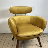 Mustard yellow velvet armchair from the 2010s.