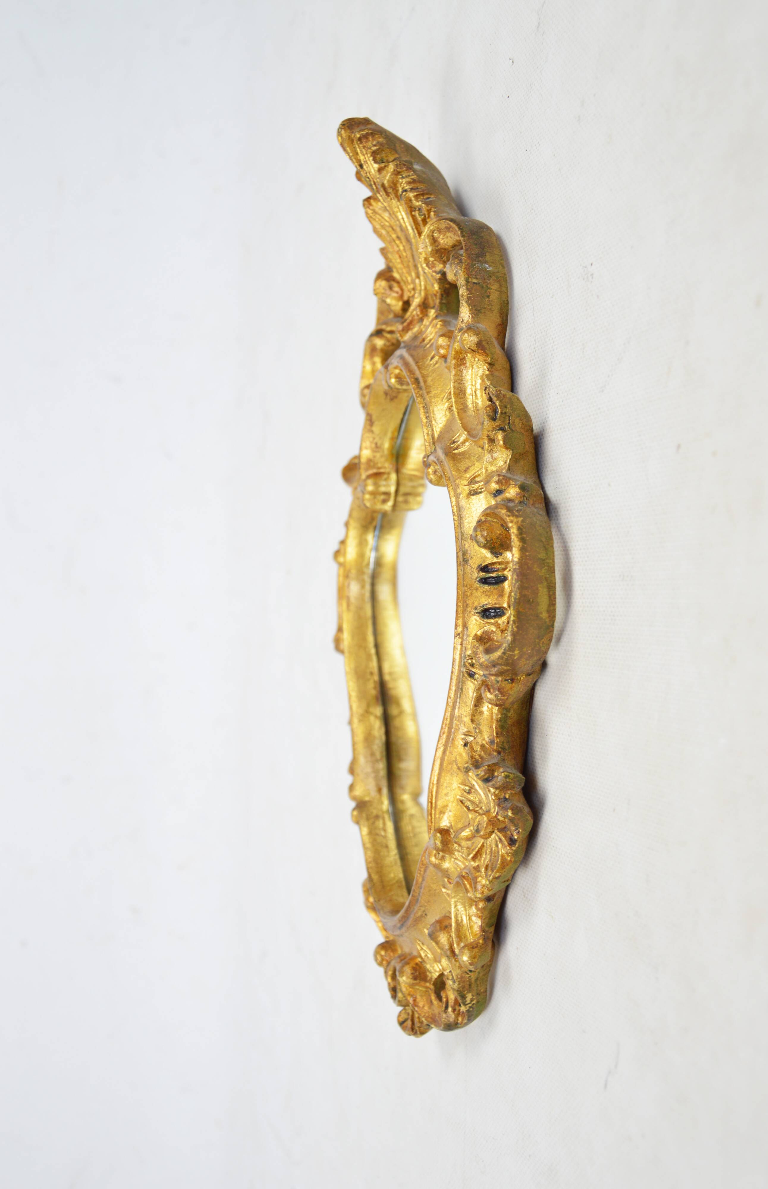 Mirror in a decorative frame, 1970s
