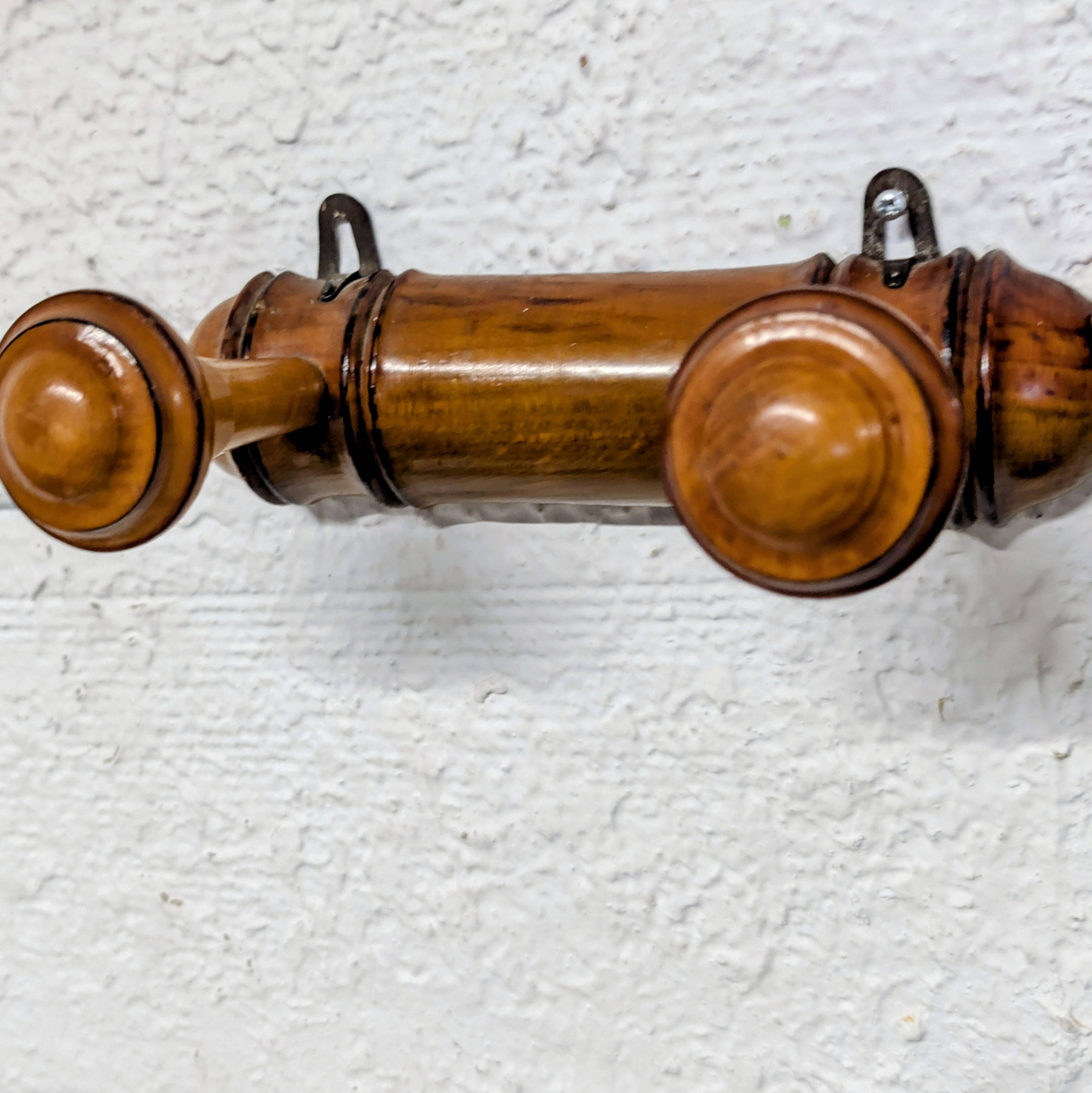 Turned wooden coat rack