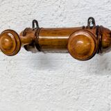 Turned wooden coat rack