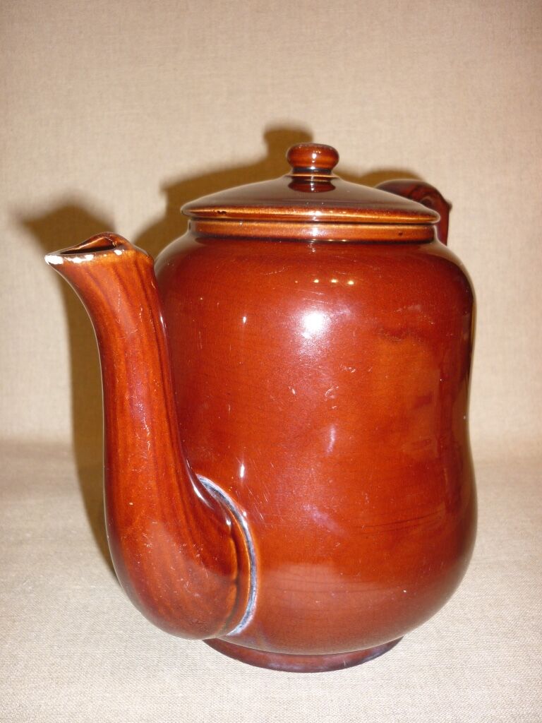 Very large brown ceramic coffee maker