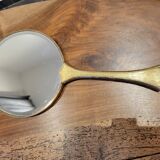 Brass hand mirror with magnifying back