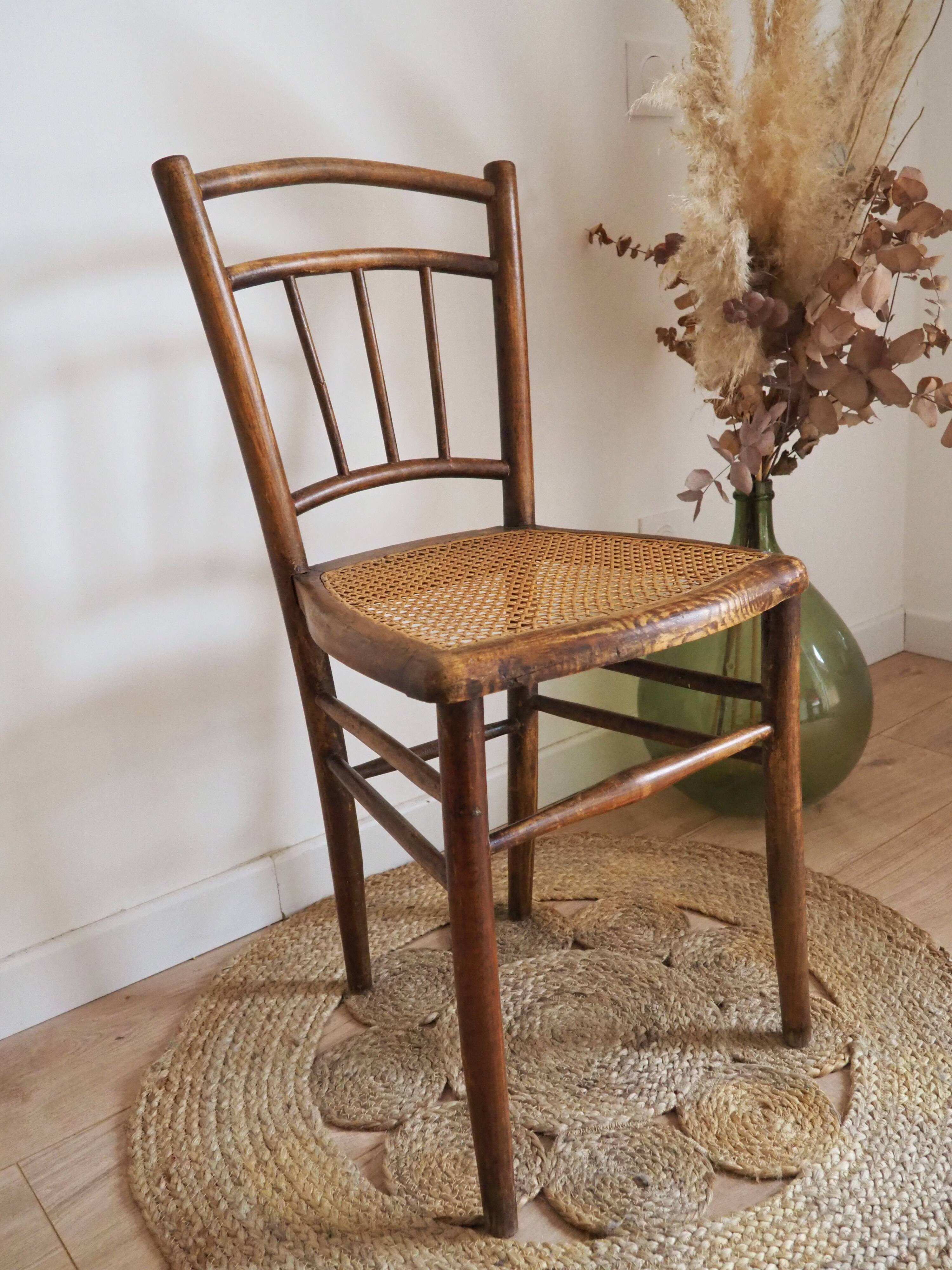 Wooden chair with cane seat
