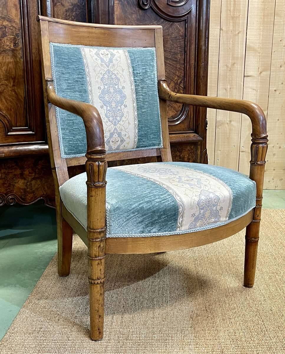 Restoration period armchair in 19th century cherry