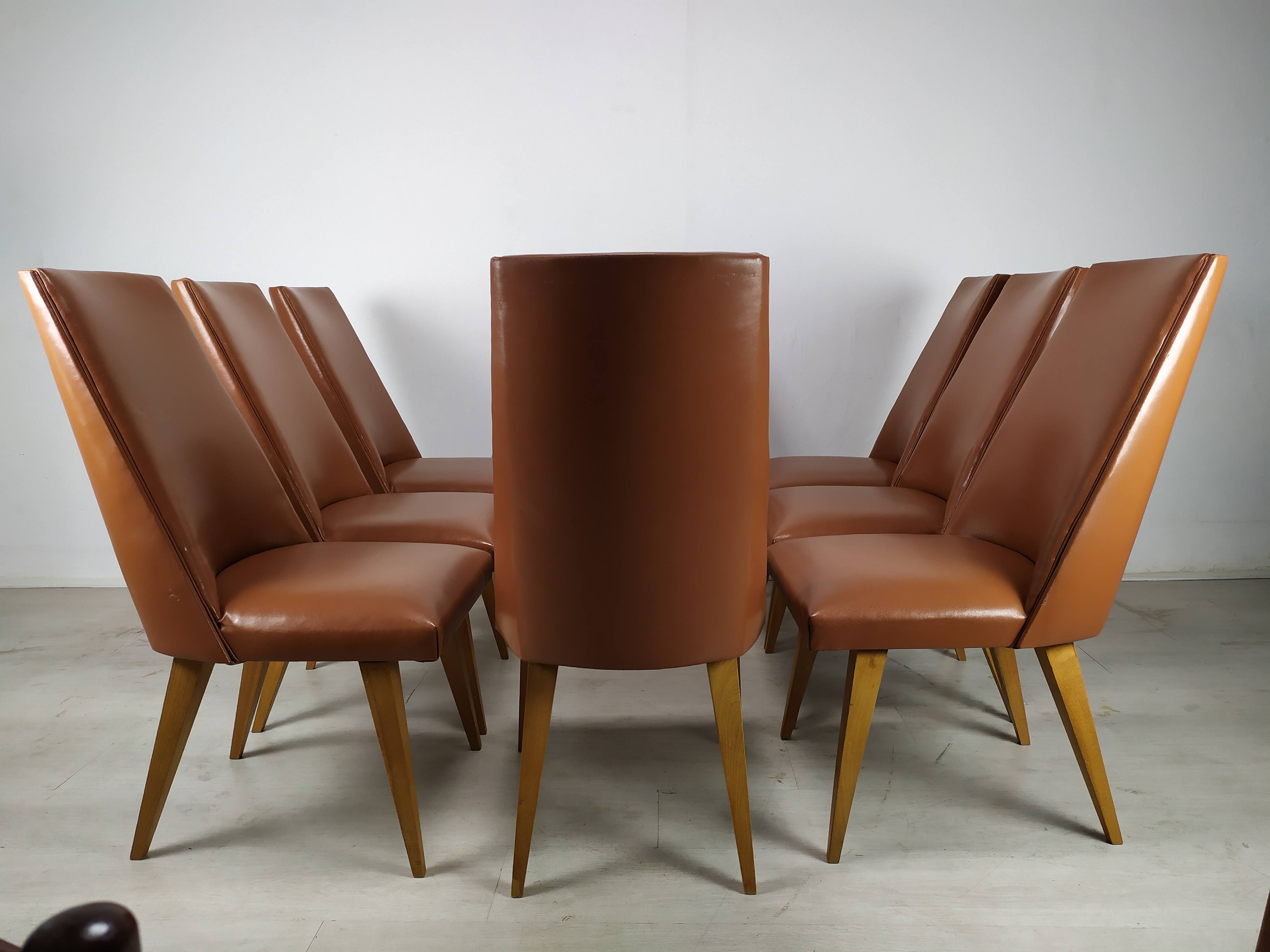 8 brown skai chairs 1950