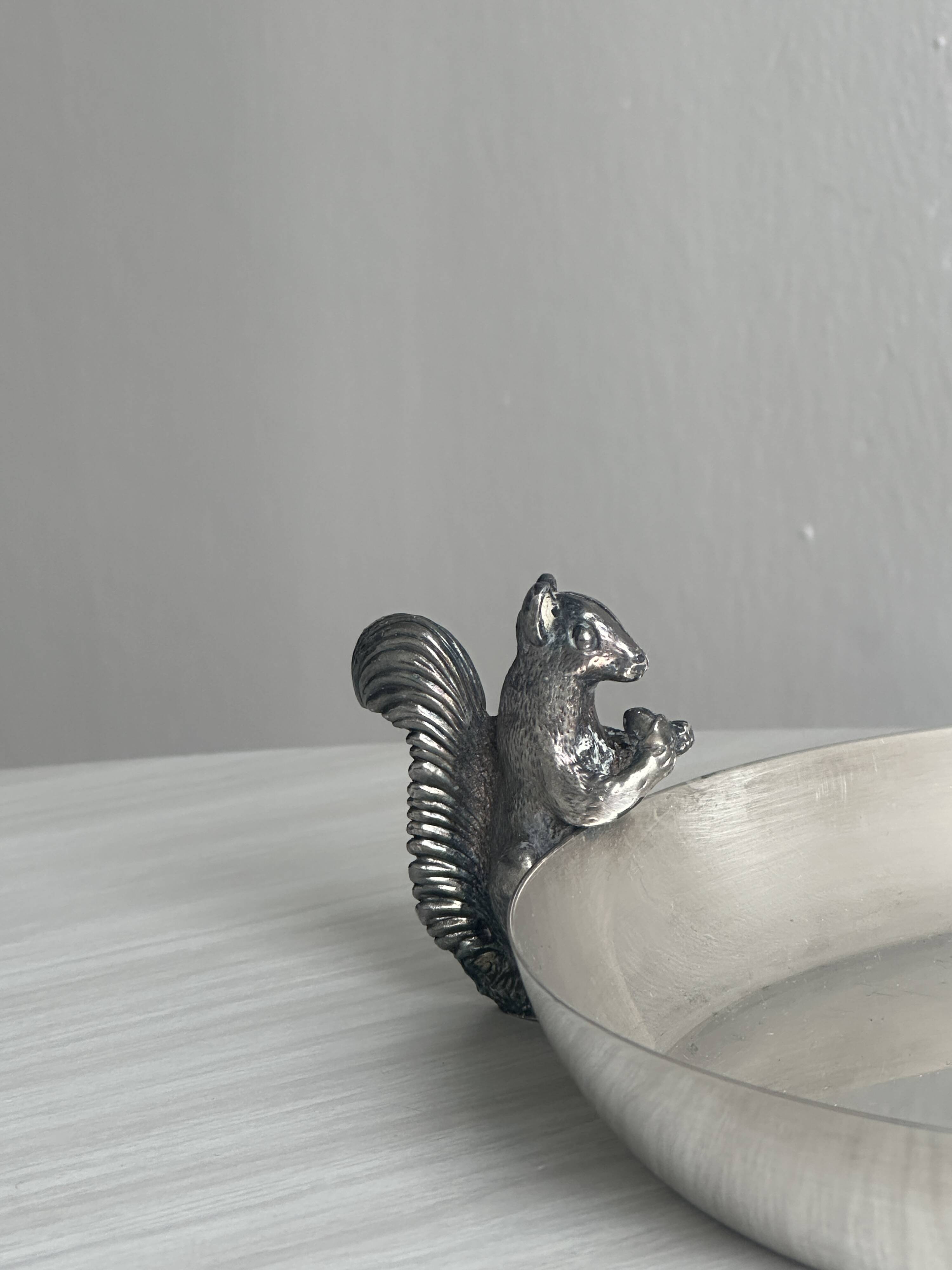 Small shiny silver metal dish