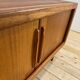 Dyrlund buffet in teak with sliding doors and interior drawers, Denmark 1960.