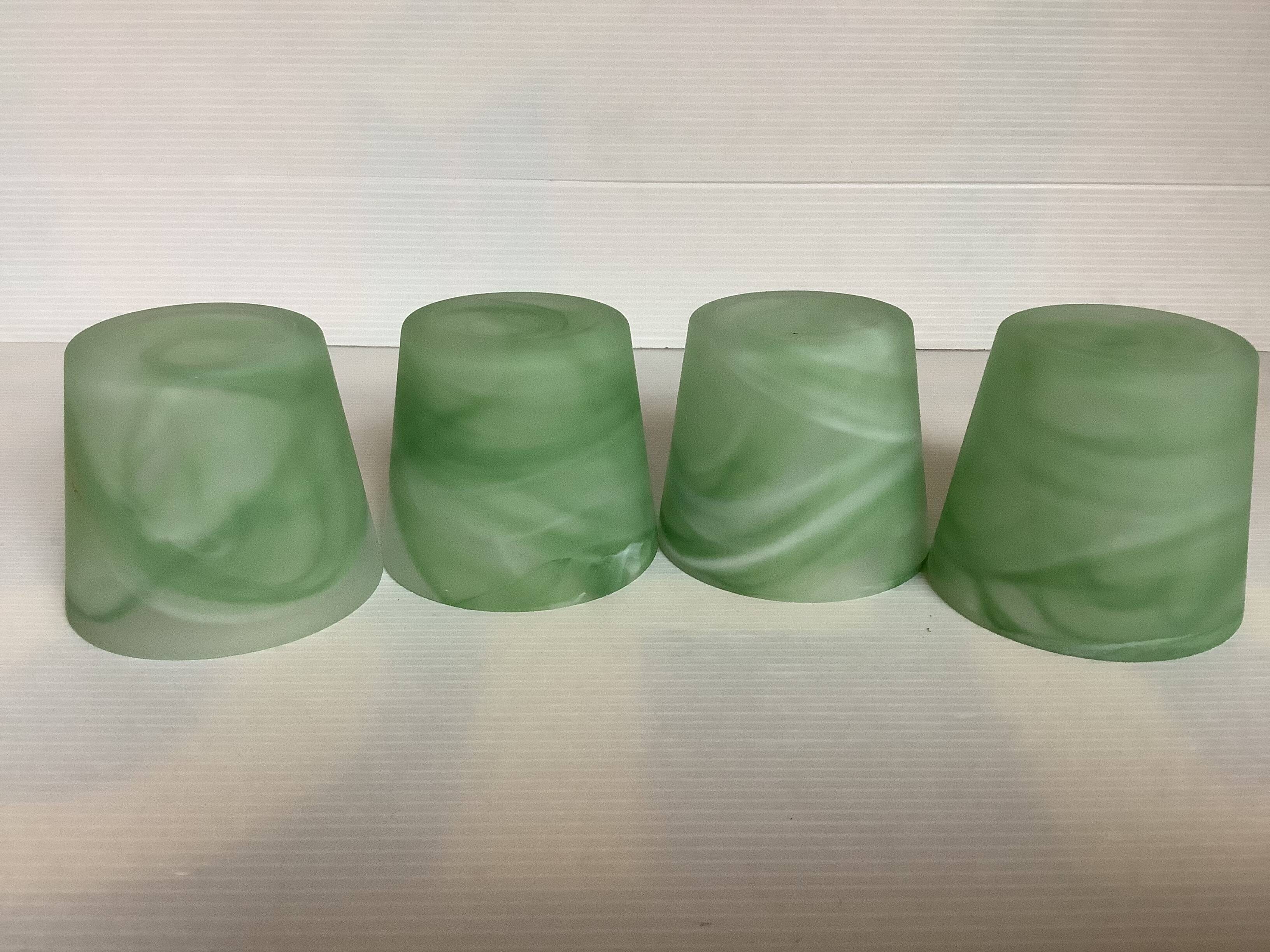 Four green glass paste candle holders