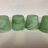 Four green glass paste candle holders