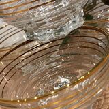 Set of 4 glasses of golden border champagne