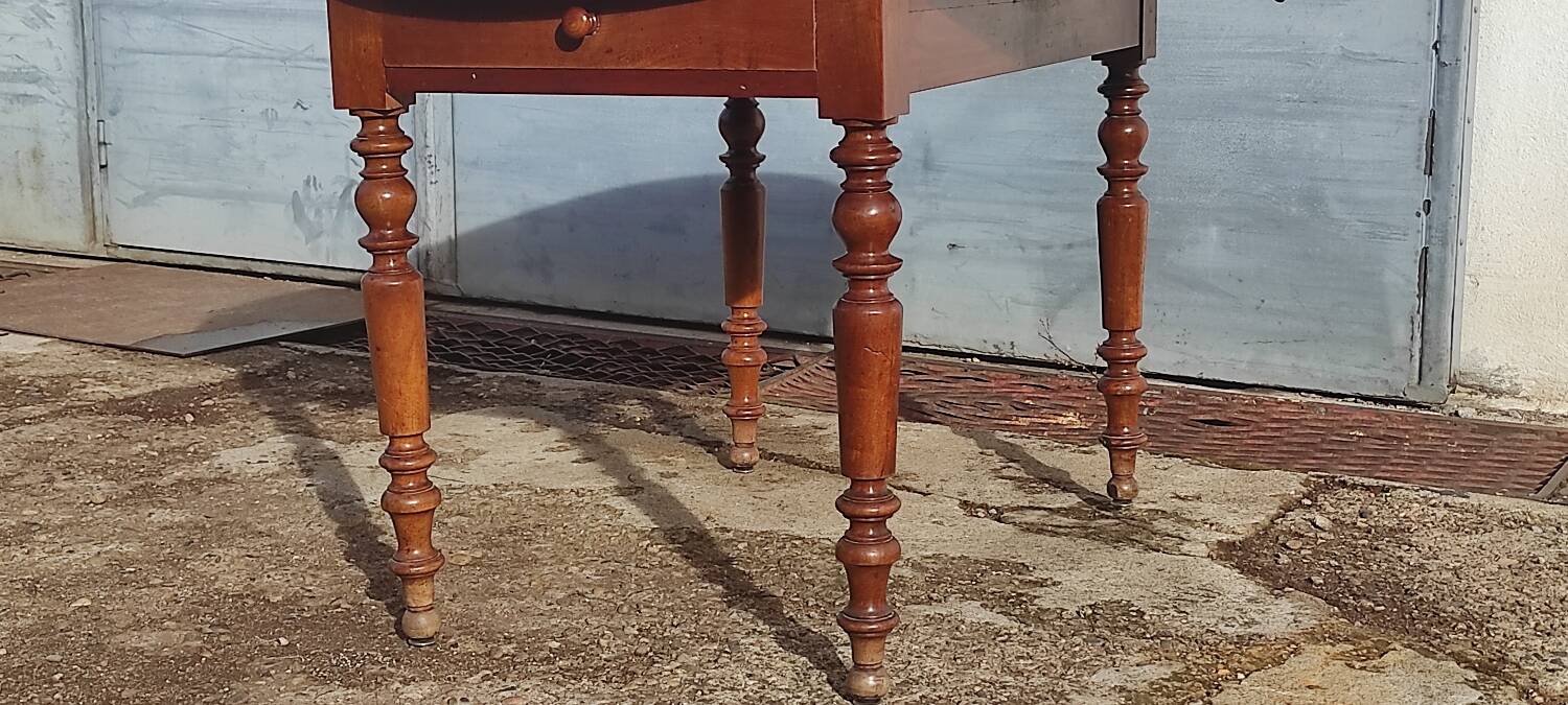 Old extendable round table in fruit wood with folding sides