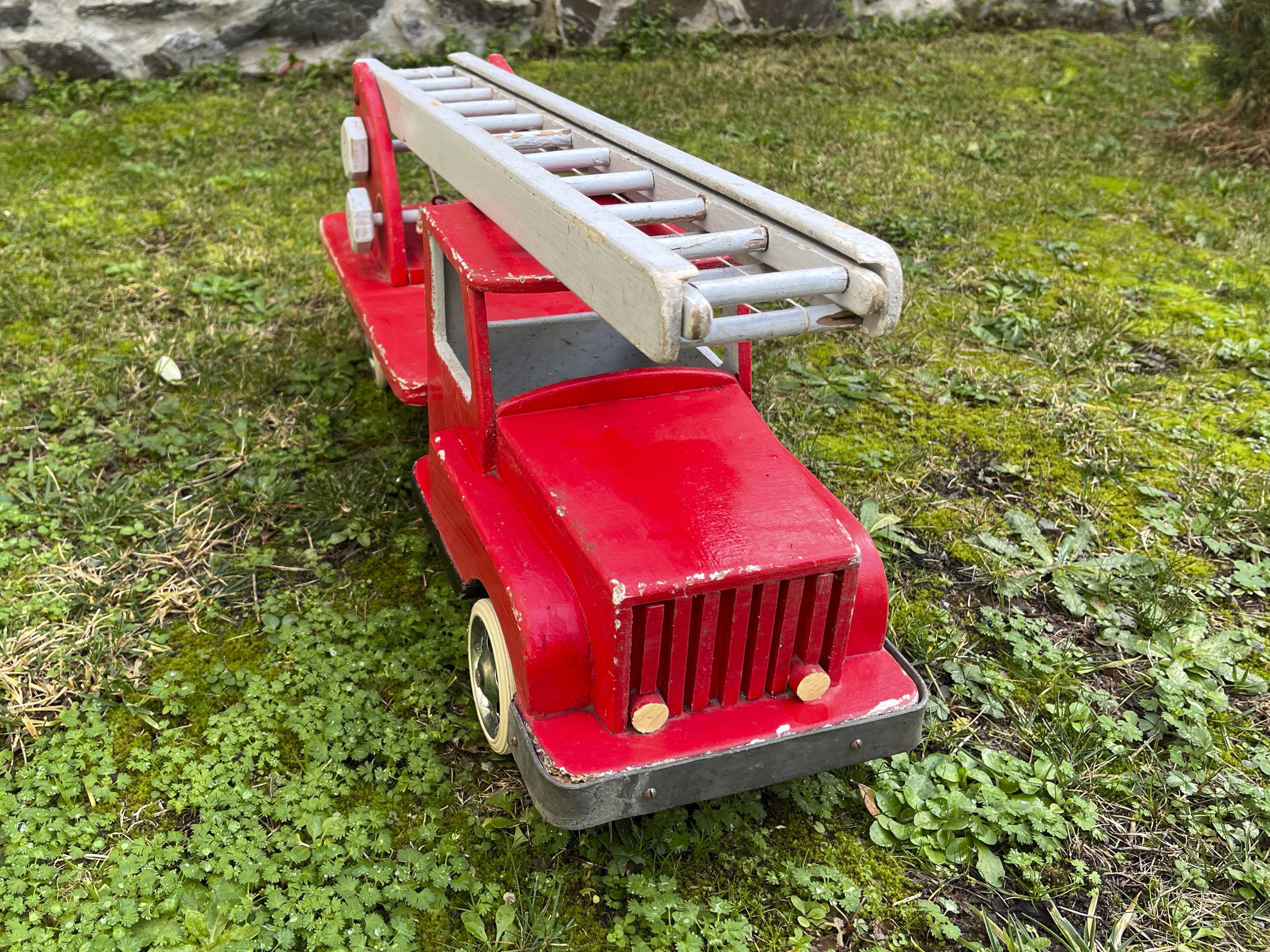 Fire truck with wooden ladder