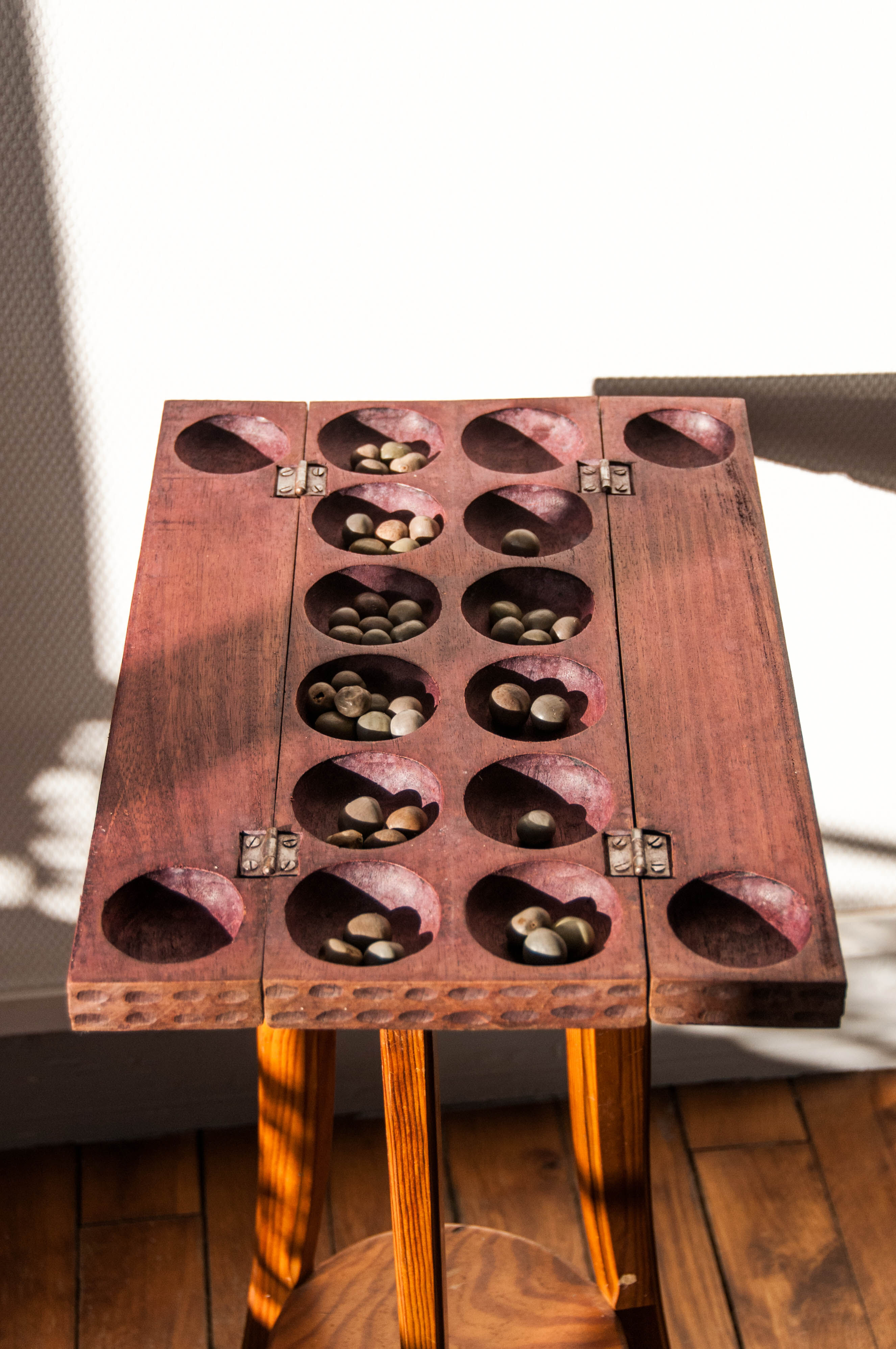 Awalé african wooden games