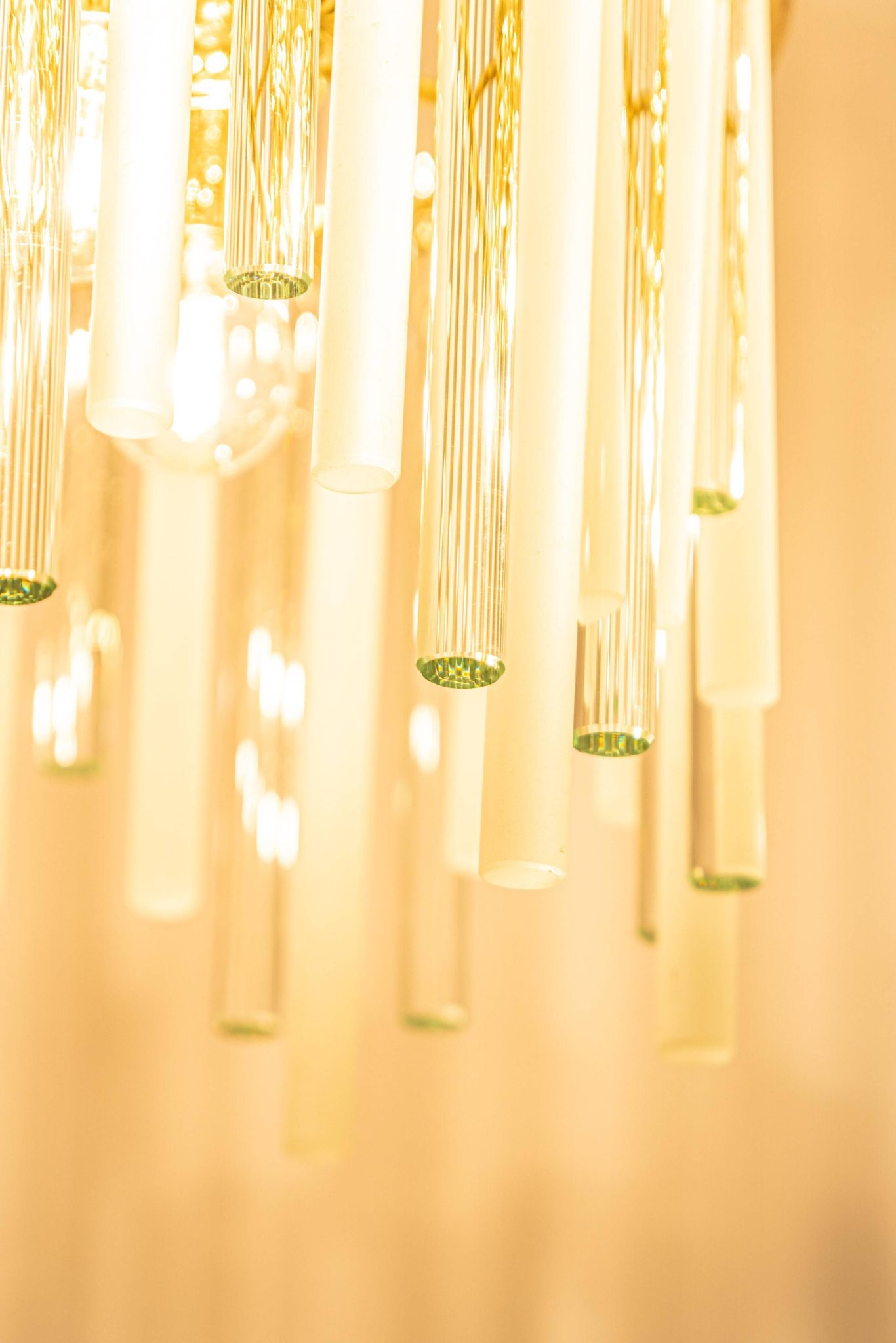 golden brass chandelier with crystal glass rods by C. Palme, Germany, 1970s.