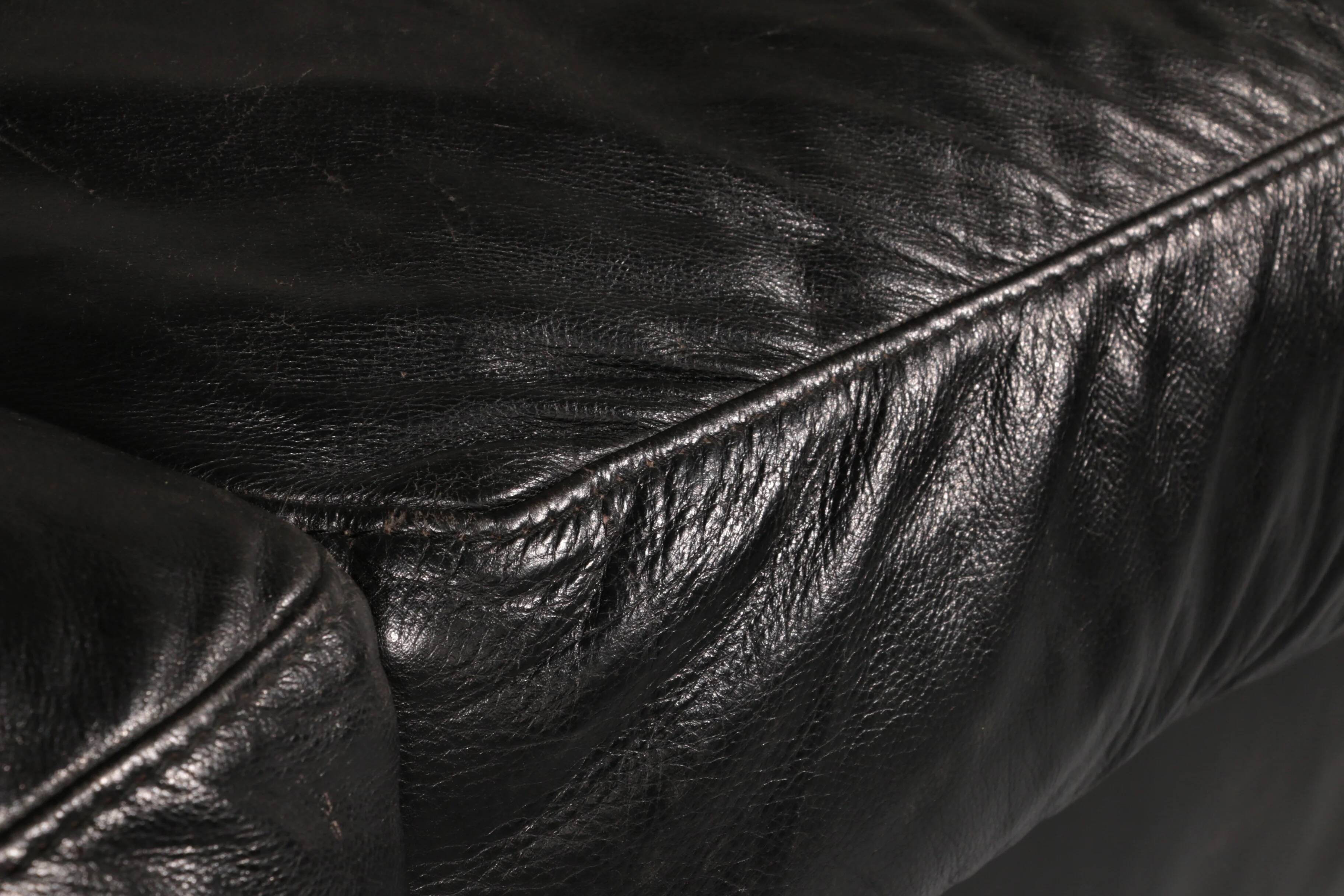 Organically shaped post-modern sectional sofa in black leather