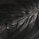 Organically shaped post-modern sectional sofa in black leather