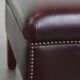 Ensemble de 2 fauteuils à oreilles en cuir de vachette + pouf de style anglais