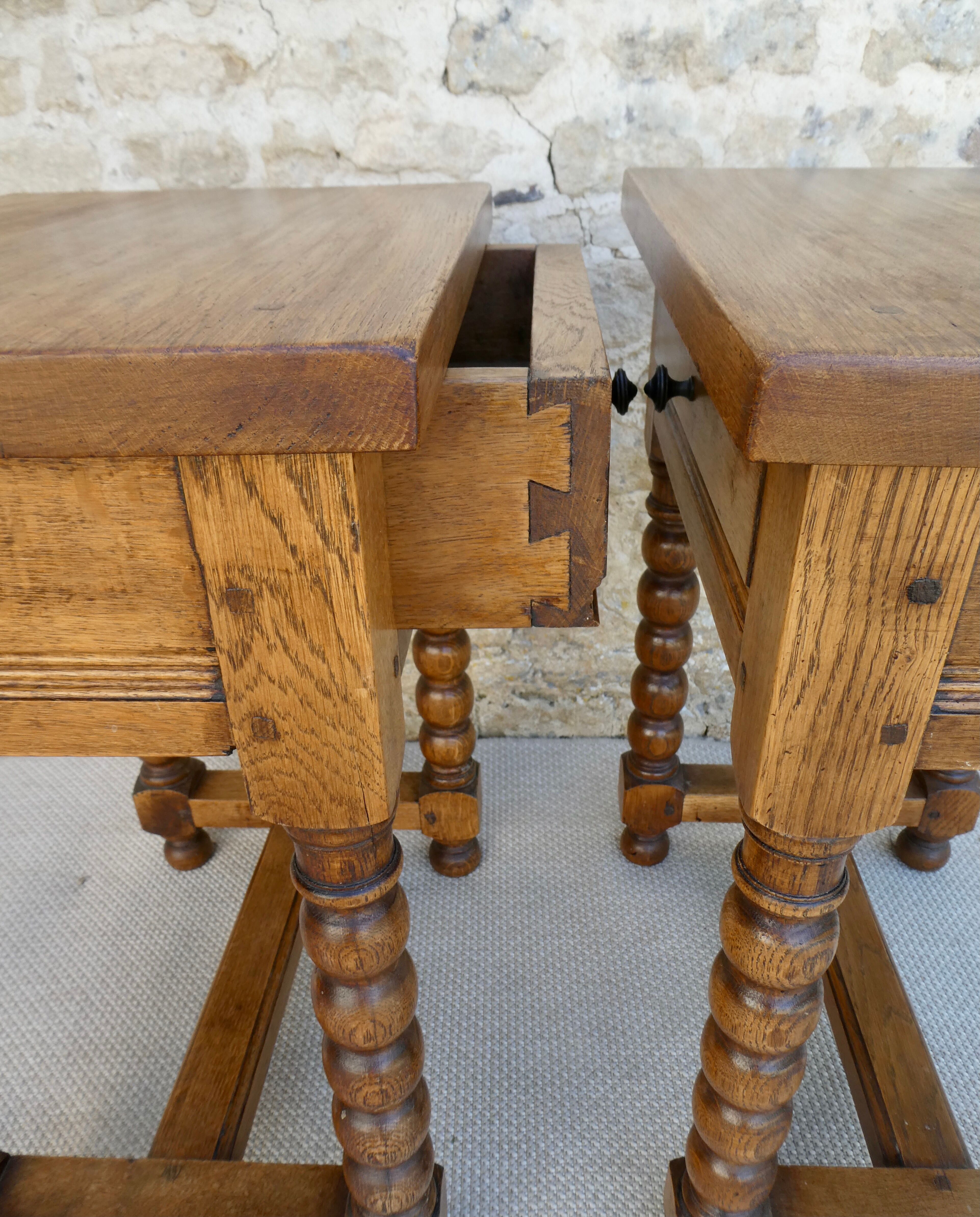Pair of solid oak bedside tables with carved legs