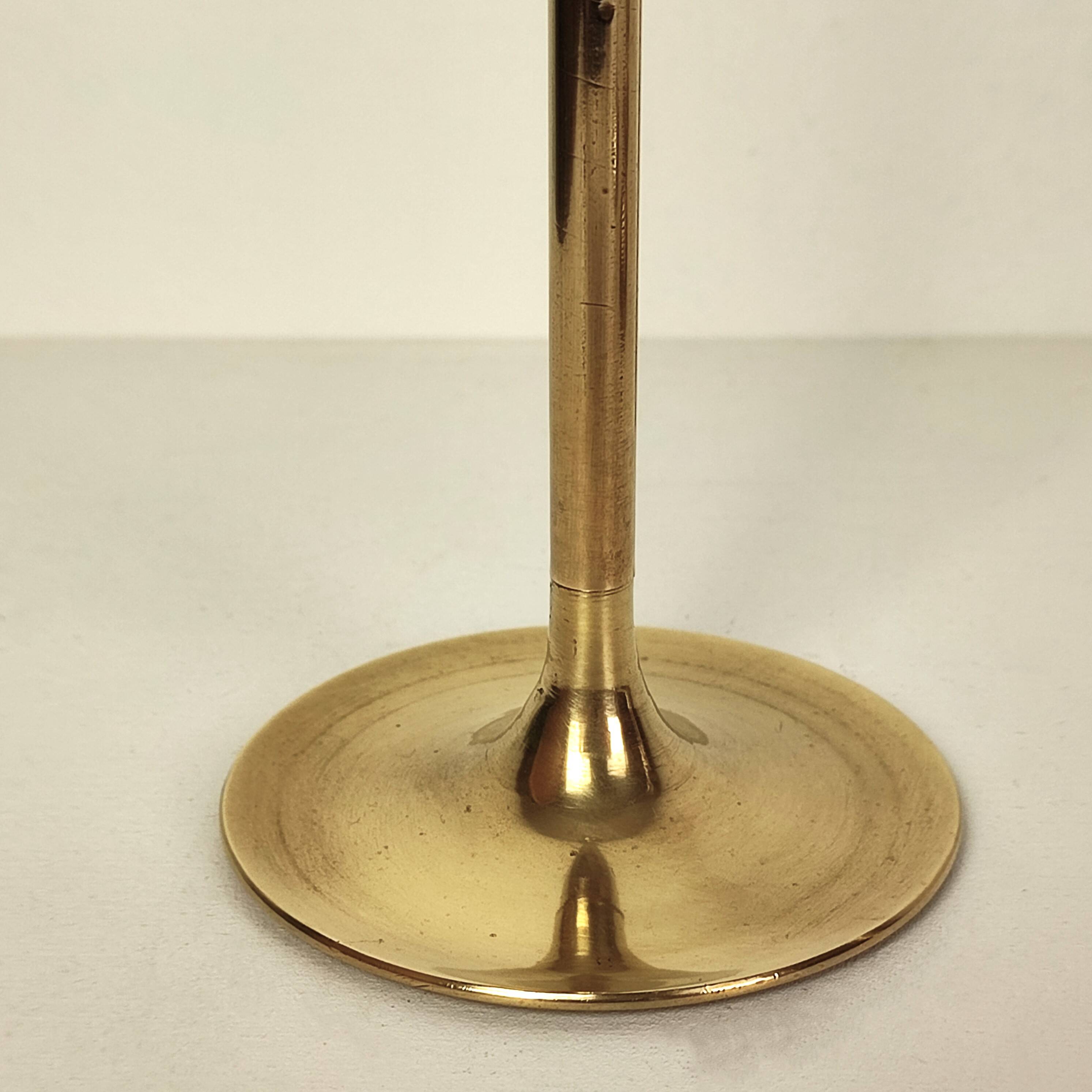 Set of 7 brass candlesticks