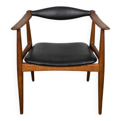 Chaise en chêne et cuir noir, modèle ''Yoke'' CH-34 par Hans J. Wegner pour Carl Hansen & Søn, Danemark, 1960.