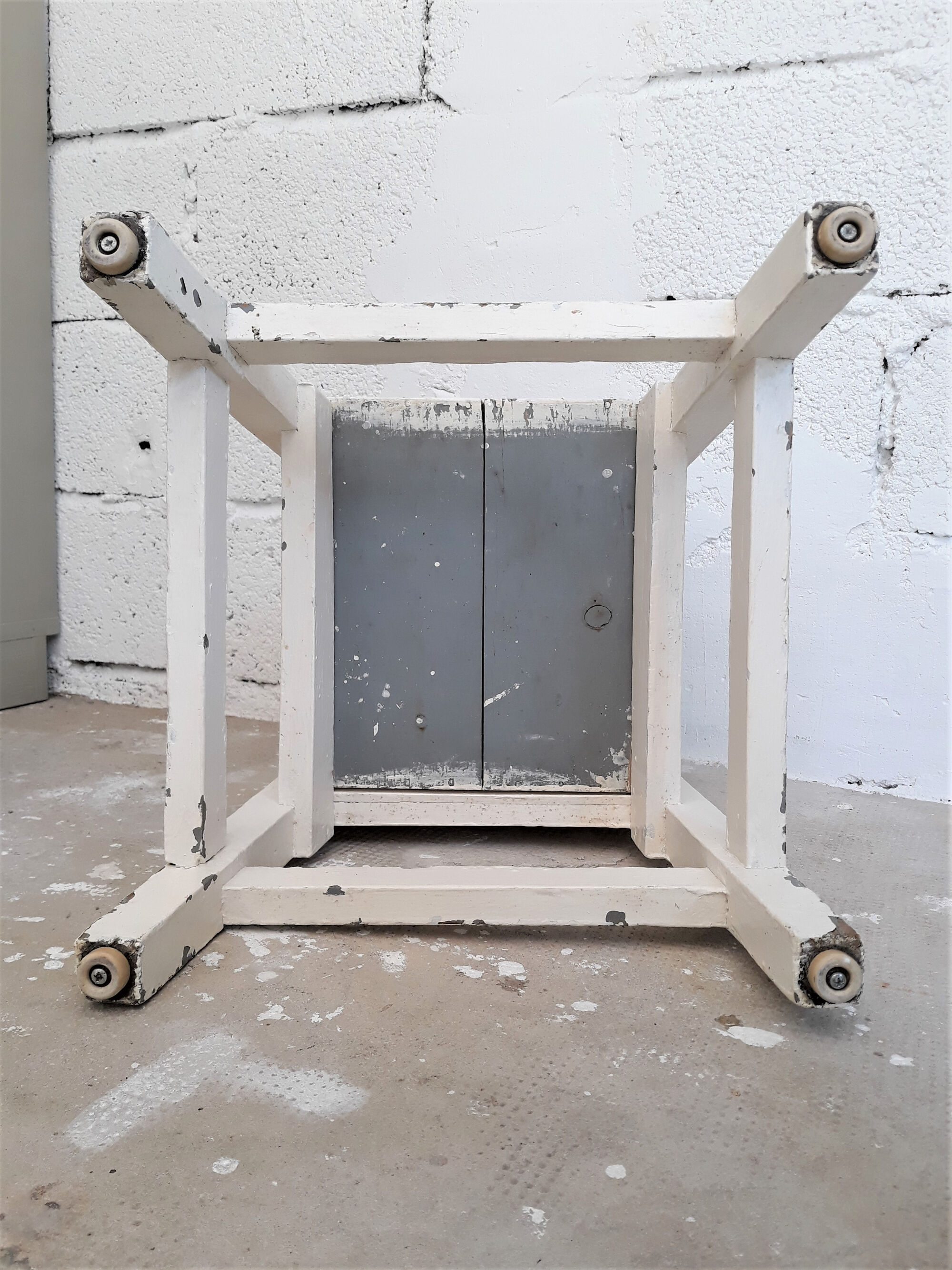 Wooden waxer's stool with drawer