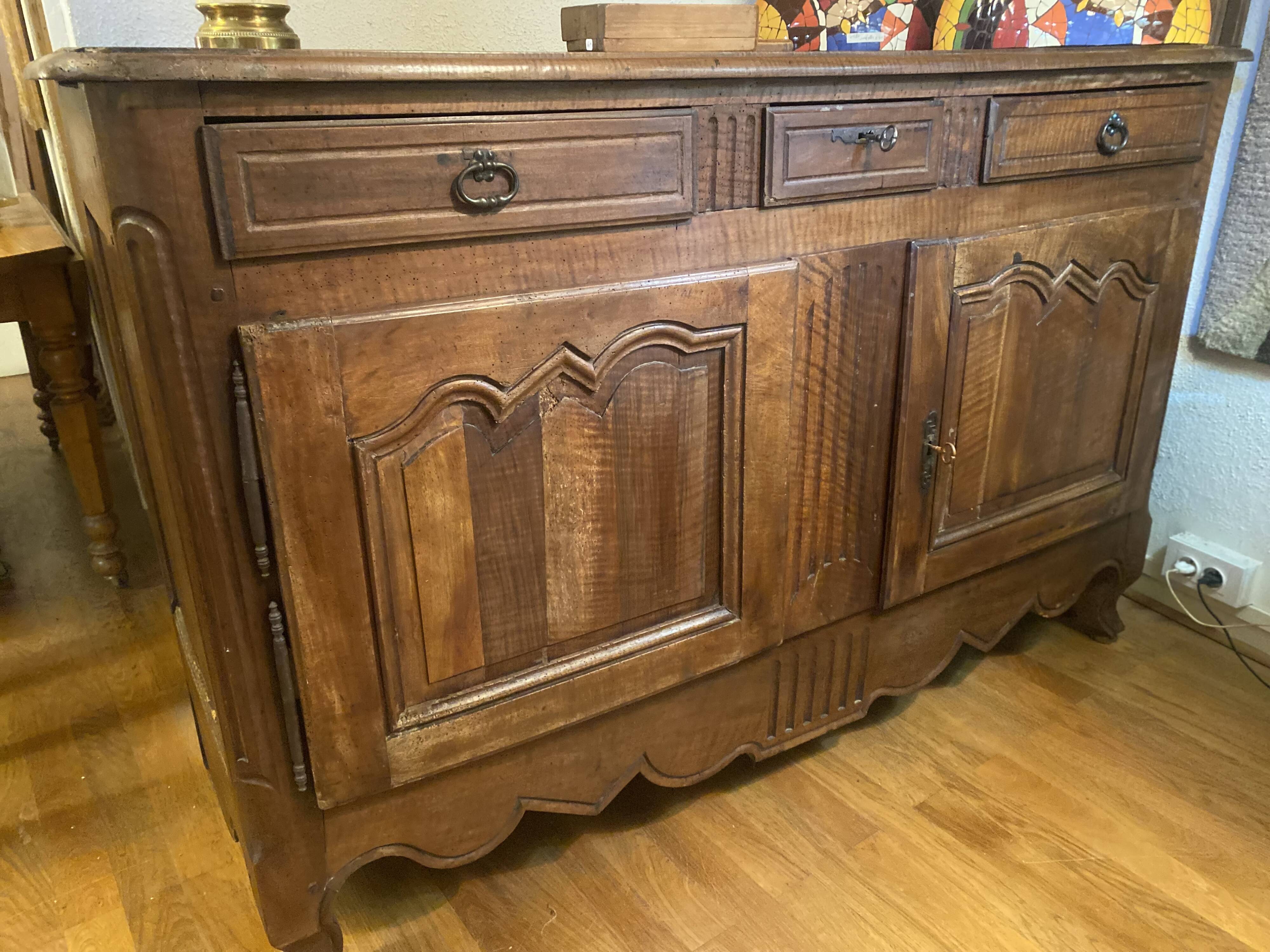 Important Louis XV style walnut sideboard.