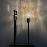 Table lamp with a vintage golden lampshade