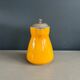 Antique teapot in earthenware with a tin filter lid.