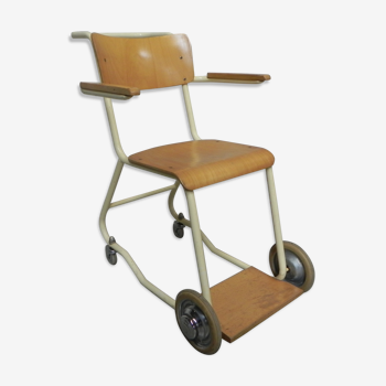 Vintage chair on wheels, wheelchair