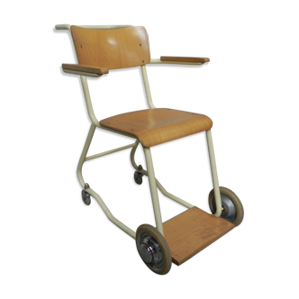 Vintage chair on wheels, wheelchair