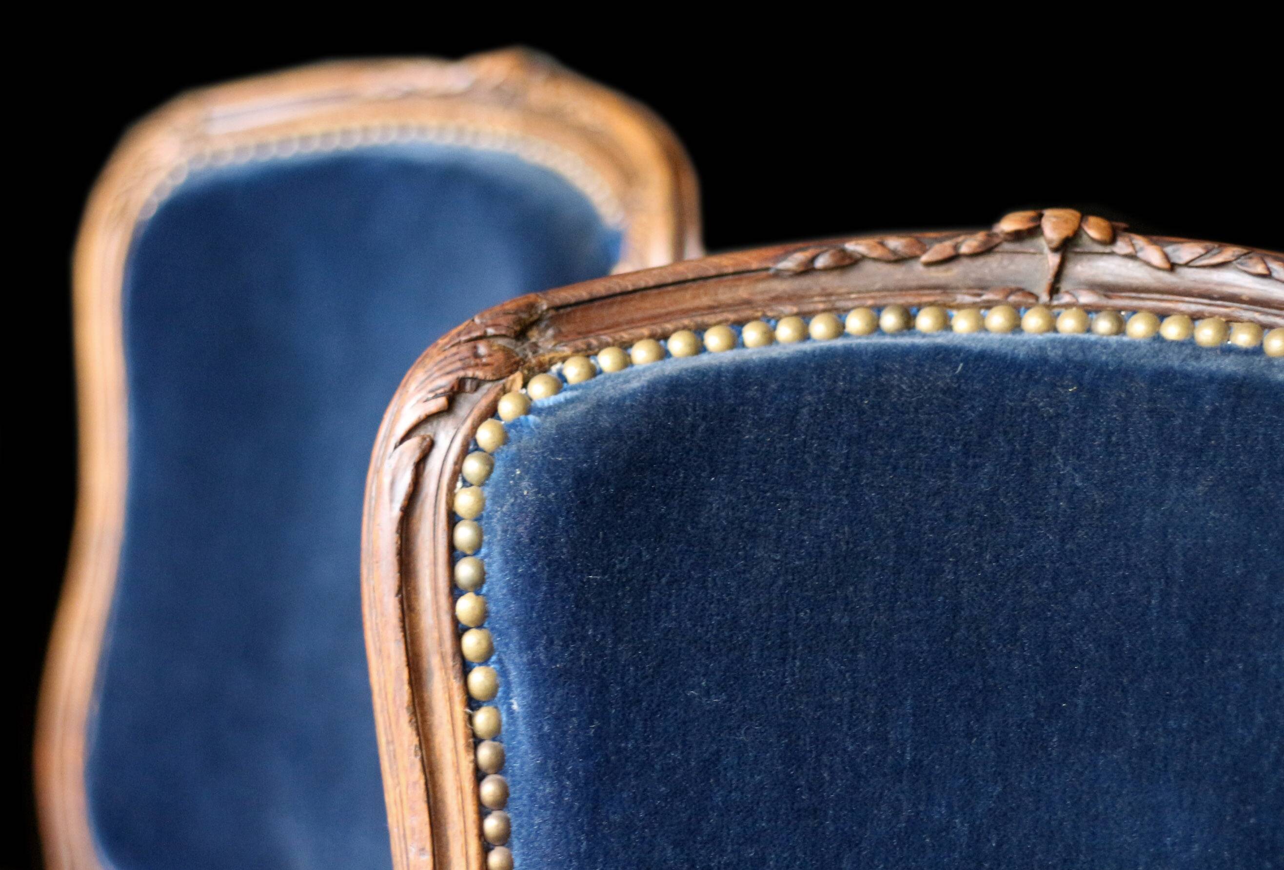 Adorable pair of low chairs from the 19th century. Wood and velvet fabric.