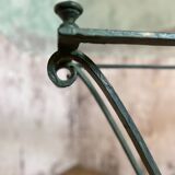 Console in glass and antique patinated metal