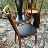 Four vintage beech and skai chairs