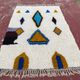Moroccan Berber rug in cream and blue 250x150 cm – colourful geometric patterns