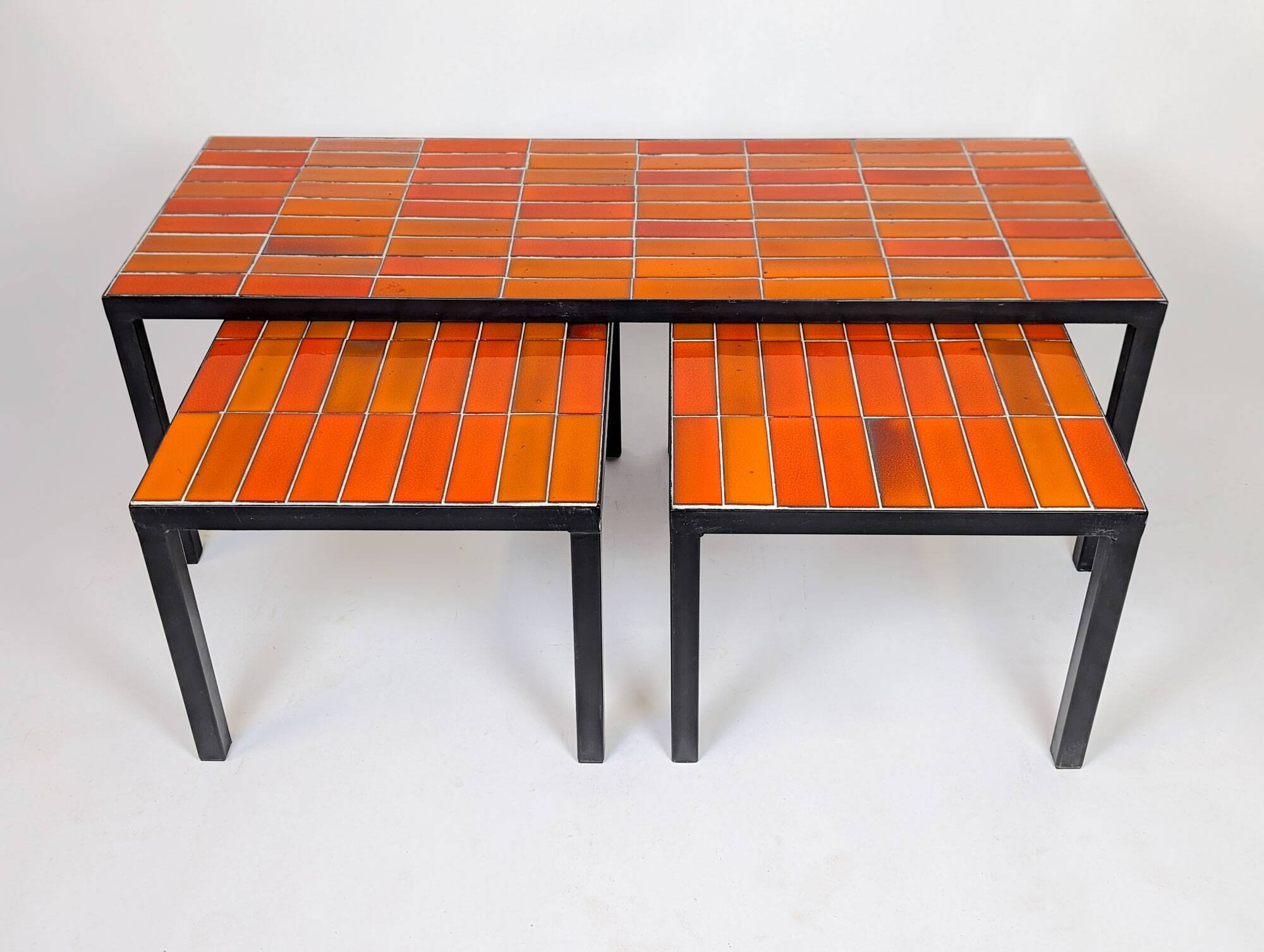 Three nesting tables in orange ceramic, attributed to Roger Capron, 1960