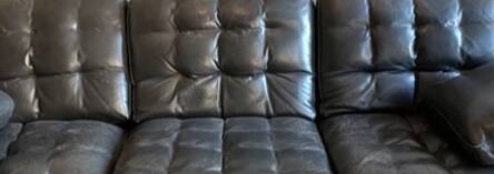Vintage high-end black leather sofa