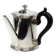 Christofle teapot in silver-plated metal, with a blackened wood handle — late 19th century, early 20th century.
