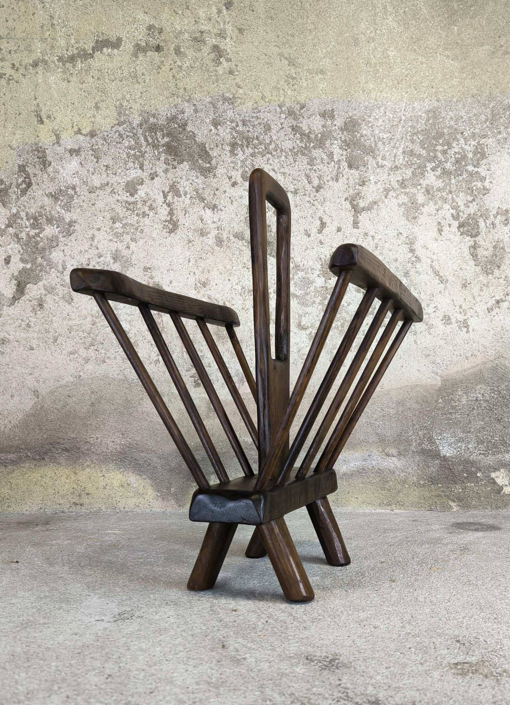 Vintage magazine rack in solid wood.