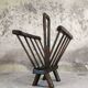 Vintage magazine rack in solid wood.