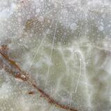 Bronze coffee table with marble top